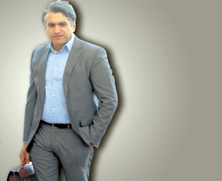 من هو وزير الاستثمار والتنمية والتعاون الدولي نجيب درويش؟